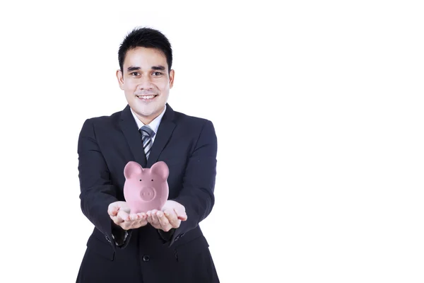 Zakenman bedrijf piggy bank — Stockfoto