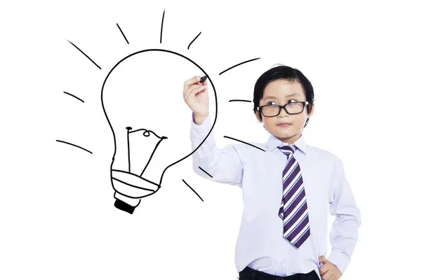 A child drawing light bulb — Stock Photo, Image