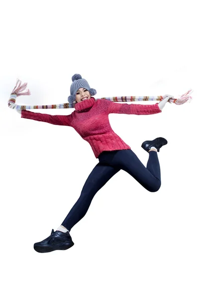 Winter woman jumping full of joy — Stock Photo, Image