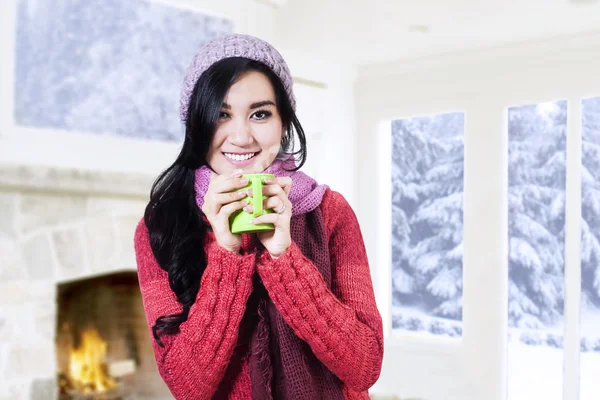 Winter woman holding hot coffee — Stock Photo, Image