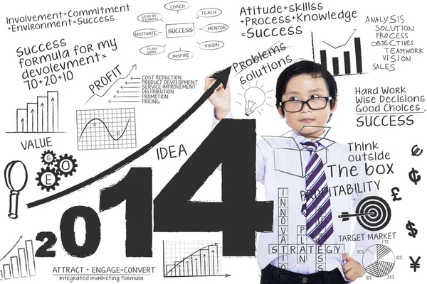 A boy writing a business concept — Stock Photo, Image