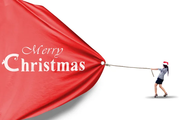 Empresária puxando banner de Natal isolado — Fotografia de Stock
