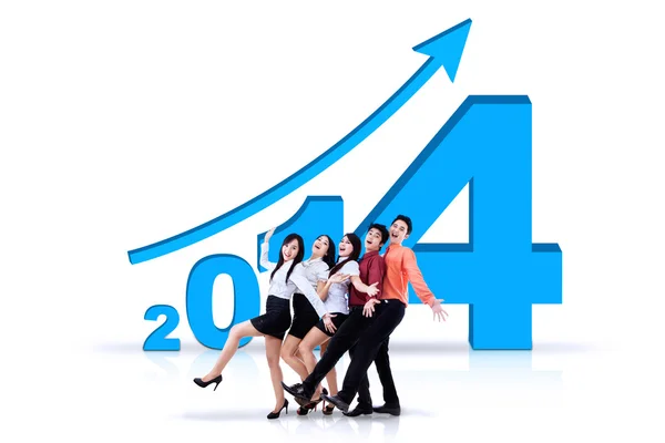 Equipe de negócios bem sucedida com o Ano Novo 2014 — Fotografia de Stock