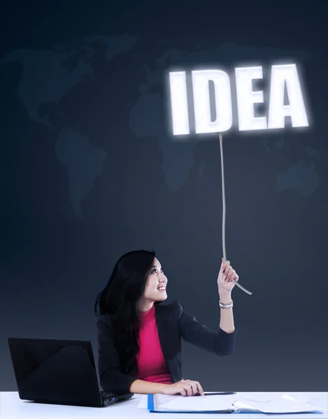 Beautiful businesswoman getting idea — Stock Photo, Image