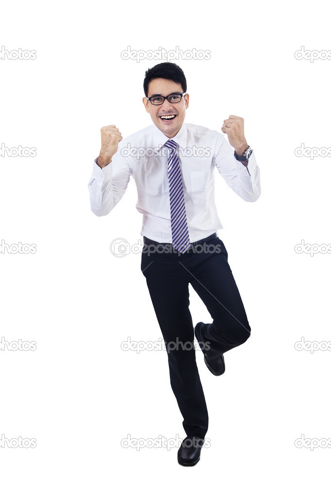 Businessman with clenched fist success isolated