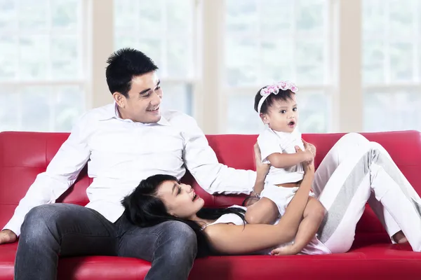 Mom dad and daughter having fun at home — Stock Photo, Image