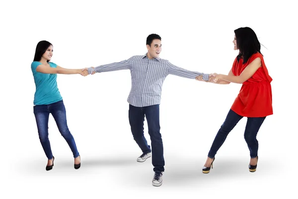 Two woman fighting for a man — Stock Photo, Image