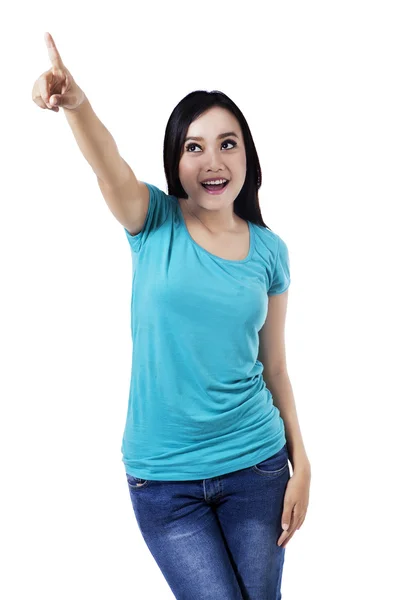 Young girl pointing at something — Stock Photo, Image