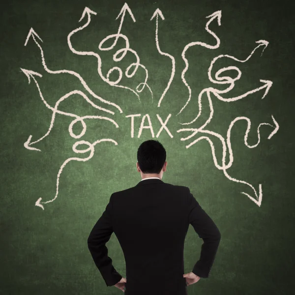 Businessman and tax problem — Stock Photo, Image