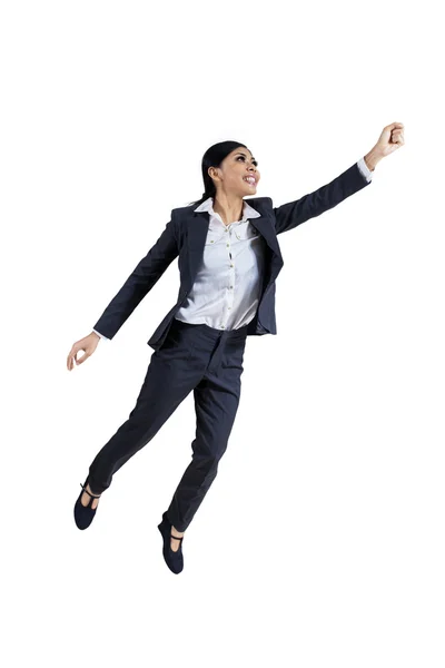 Affärskvinna poserar flyger iväg — Stockfoto