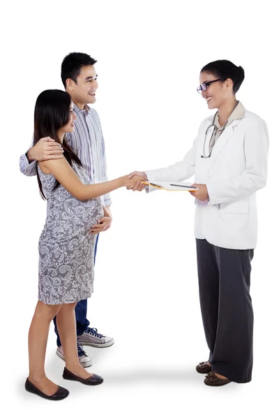 Doctor and young couple patients — Stock Photo, Image