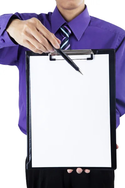 Businessman showing a blank clipboard — Stock Photo, Image