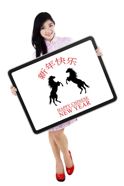 A woman showing greeting board — Stock Photo, Image