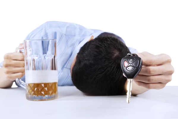 Alcoholic offering a car key — Stock Photo, Image