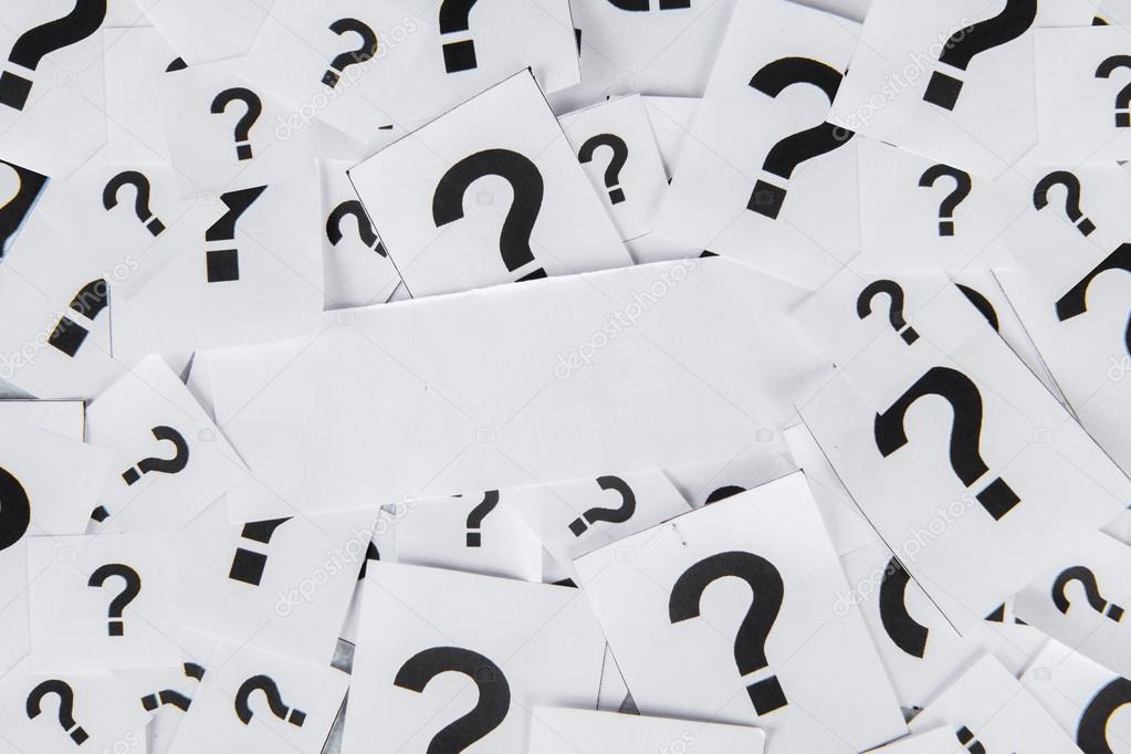 Blank paper with question marks