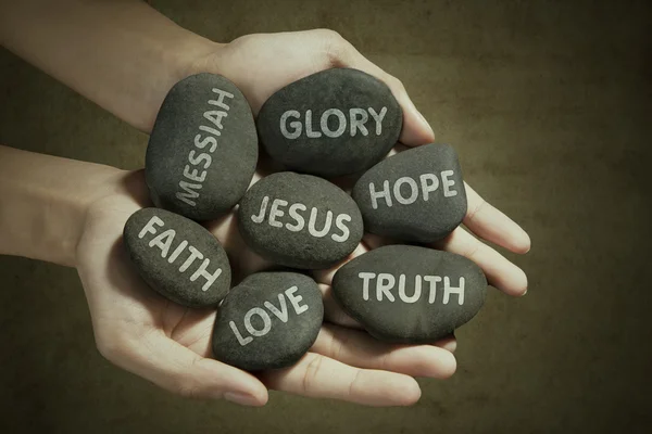 Man holding stones — Stock Photo, Image