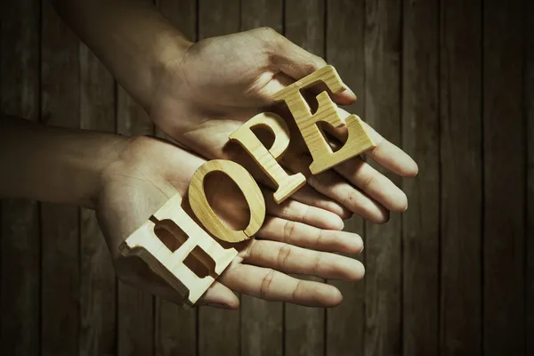 Male hands holding hope — Stock Photo, Image