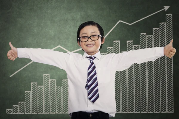 Successful little businessman showing thumbs up — Stock Photo, Image