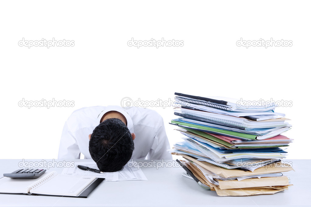 Businessman sleeping on the desk