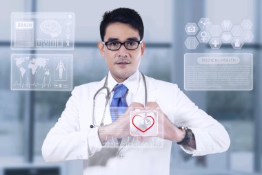 Medical doctor showing heart shape clipart