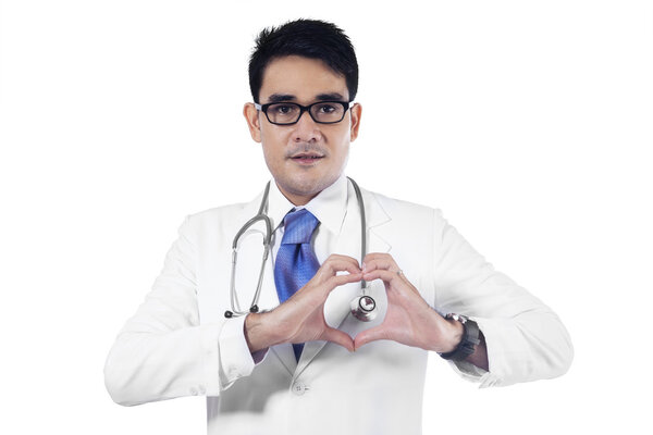 Closeup of doctor making heart shape