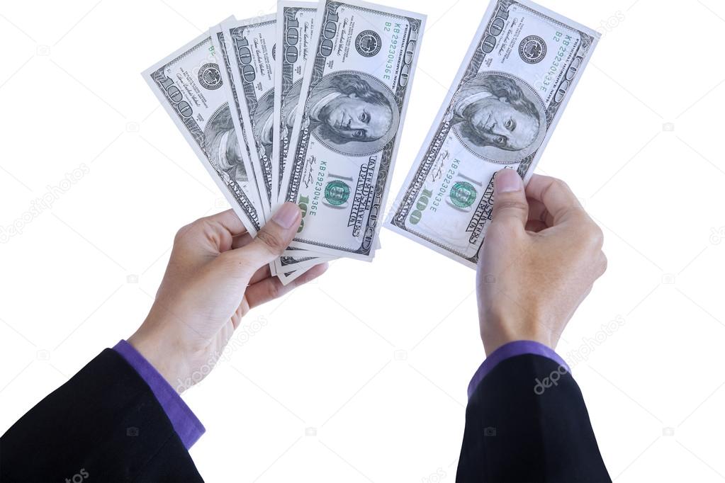 Businessman counts money in hands