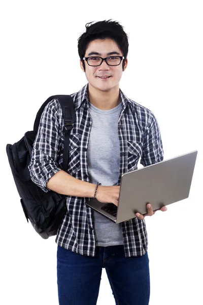 Studente maschio con laptop isolato — Foto Stock