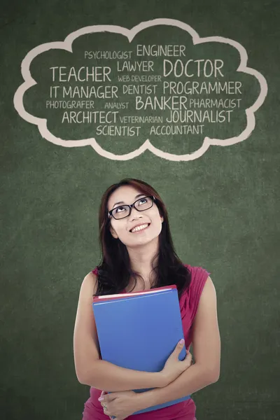 Young student is thinking her dream — Stock Photo, Image