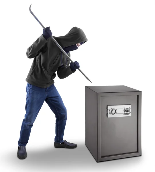 Burglar tries to open a safe deposit box — Stock Photo, Image