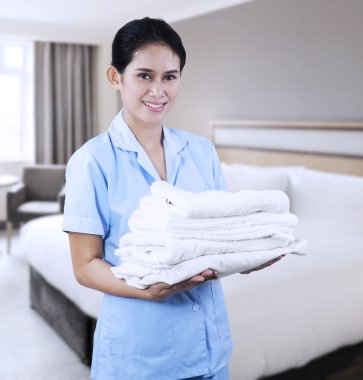 Cleaning lady at hotel room