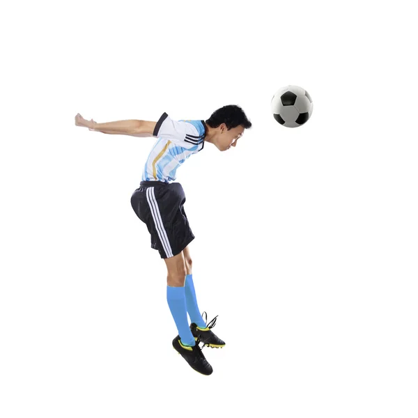 Argentinischer Spieler köpft Ball isoliert — Stockfoto