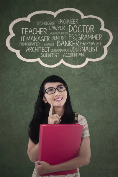 Casual student is thinking her goal — Stock Photo, Image