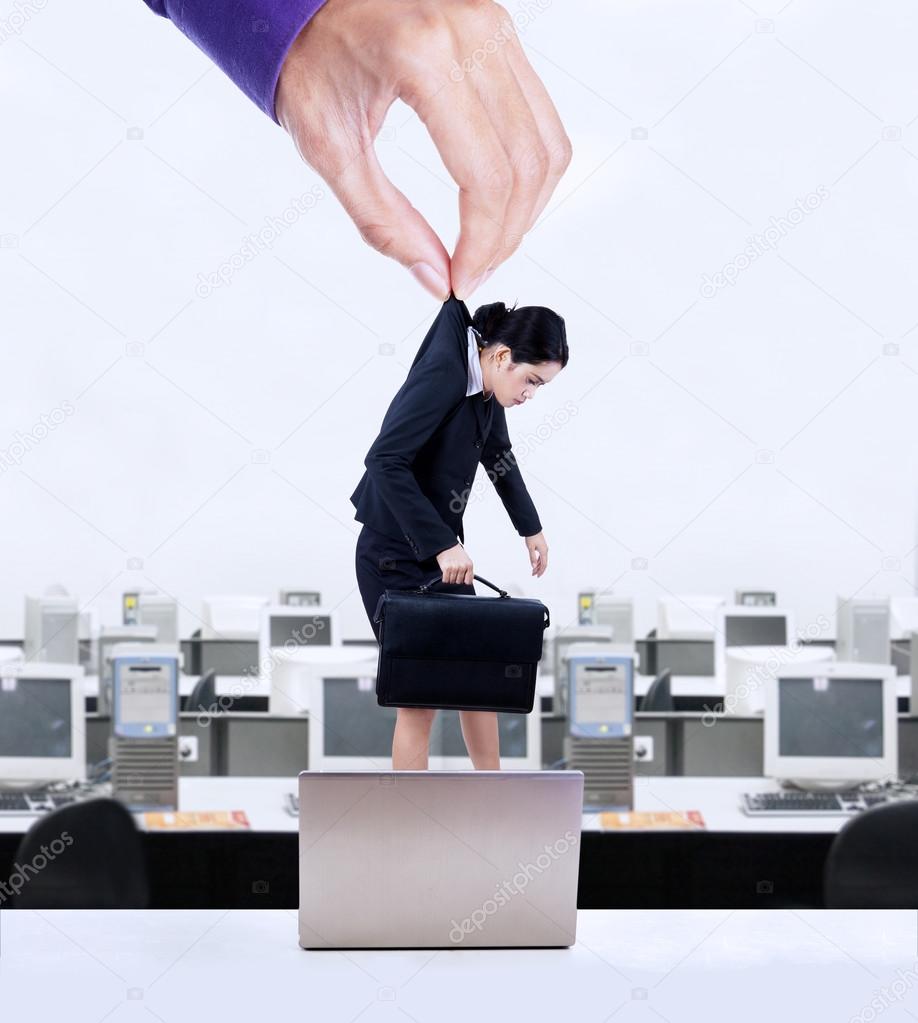 Businesswoman hanging on a hand