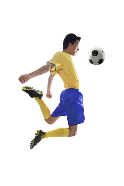 Soccer player controlling ball isolated — Stock Photo, Image