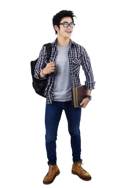 Estudante universitário masculino em estúdio — Fotografia de Stock