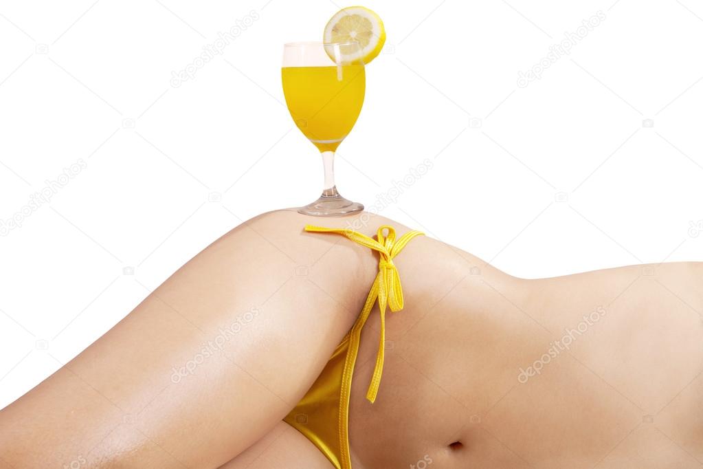 Orange juice on beautiful body