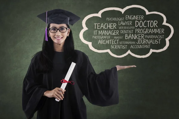 Diploma joven mostrando su aspiración — Foto de Stock