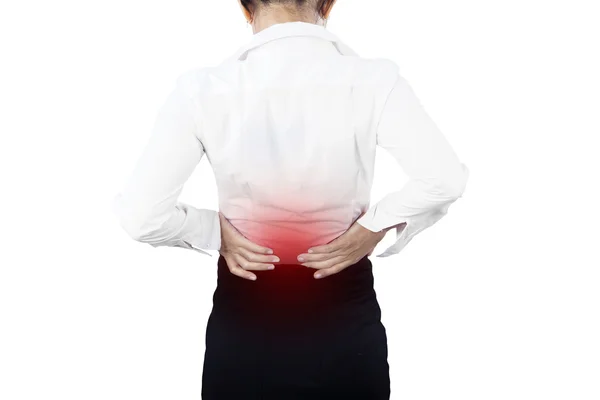 Empresária tendo dor nas costas isolada — Fotografia de Stock