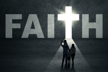 Family walks toward faith door clipart