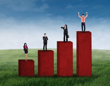 Business group standing on business chart 1