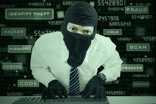Businessman wearing mask stealing data — Stock Photo, Image