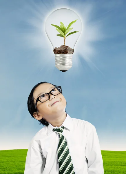 Child looking at ecology concept — Stock Photo, Image