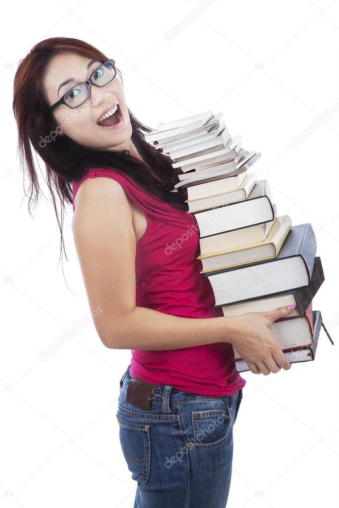 Excited student holding many books