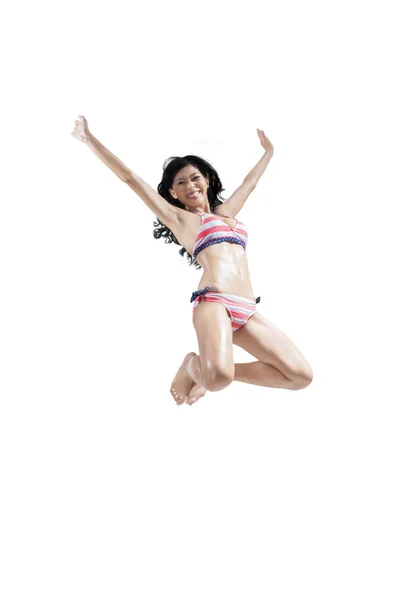 Excited woman jumping high isolated — Stock Photo, Image