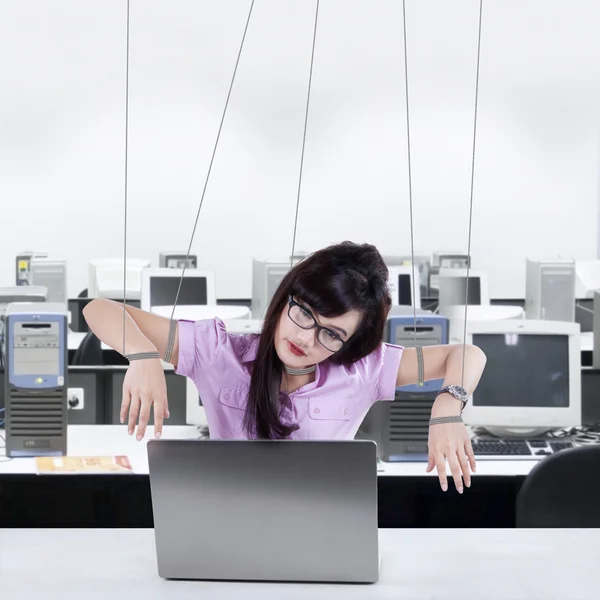 Businesswoman working like a slave — Stock Photo, Image