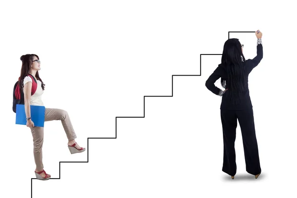 Female student follows the stair guide — Stock Photo, Image