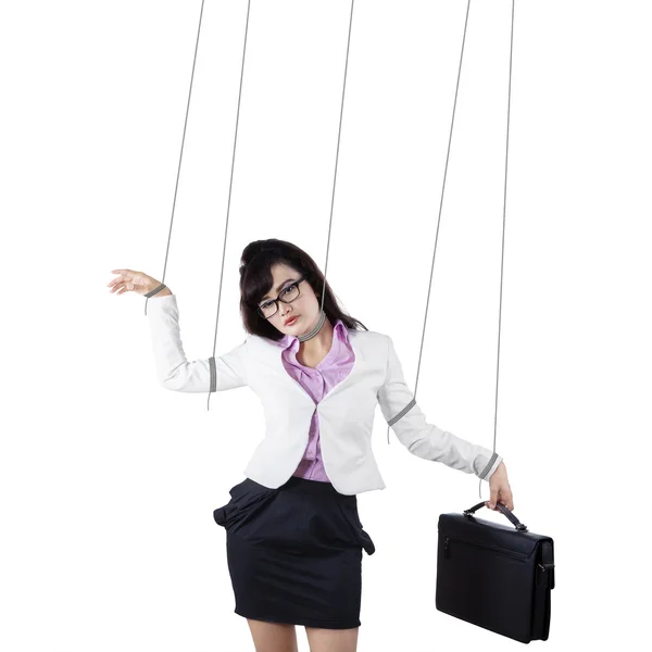 Empresária controlada por cordas isoladas — Fotografia de Stock