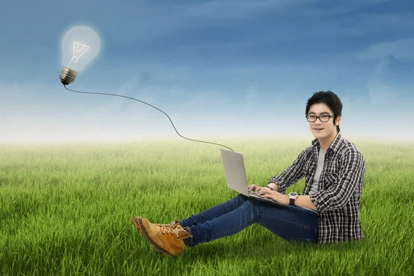 Cheerful student studying outdoors — Stock Photo, Image