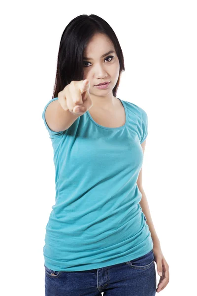 Casual woman pointing at camera — Stock Photo, Image