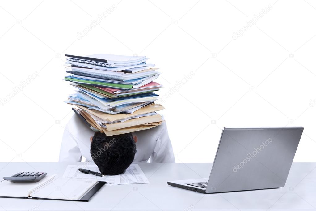Businessman with documents on his head isolated